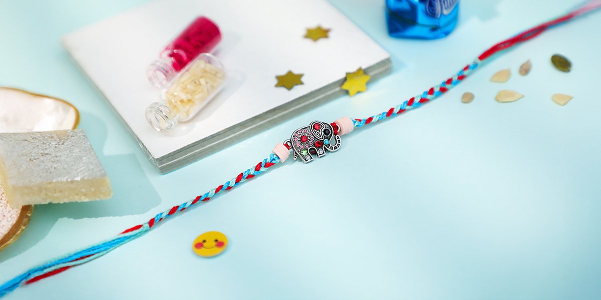 Colorful Kids Rakhi with Elephant Charm on Braided Thread – Kala Rakhi