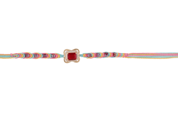 Handcrafted AD stone rakhi with red centerpiece and multicolor thread – designed by premium rakhi manufacturer Kala Rakhi