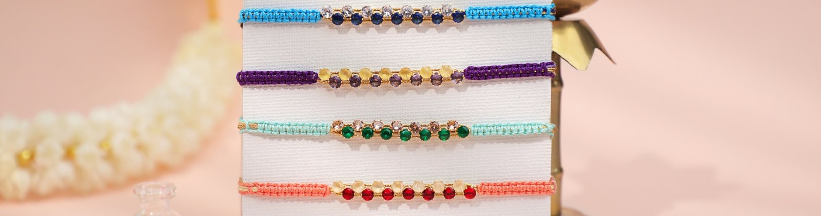 Handcrafted multicolor beaded Rakhi set with braided threads – Kala Rakhi