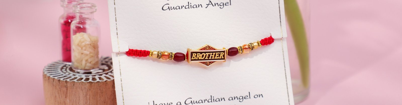Pendant Rakhi with Brother tag on red thread – made by Kala Rakhi for bulk supply