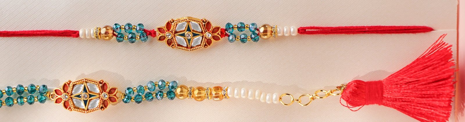 Lumba Rakhi set for Bhaiya Bhabhi with mirror work and red thread – Kala Rakhi