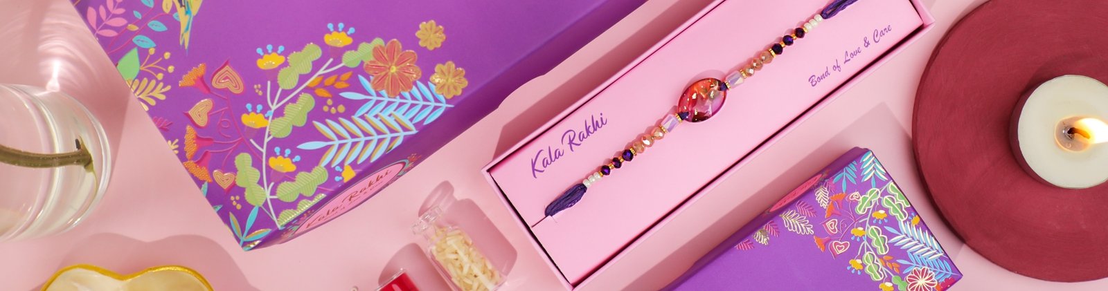 Resin Rakhi with multicolor centerpiece and purple thread – handcrafted by Kala Rakhi for bulk orders